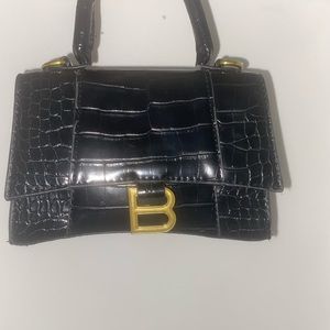 Black hourglass mini top hand bag